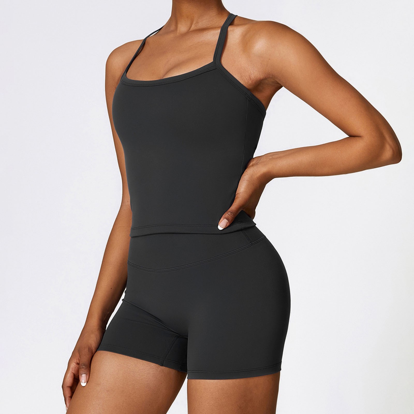 thumbnail image 3 of Conjunto de yoga de 2 piezas para mujer: camiseta sin mangas con espalda descubierta y pantalones cortos. Tejido transpirable, tirantes modernos, ideal para fitness/verano, varias tallas., 3 of 7